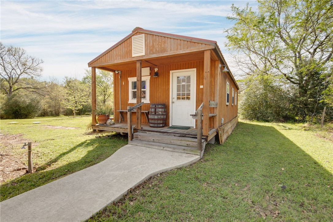 209 Ranchette Court Bryan, TX 77808 - Photo 29 of 37 a view of a house with backyard