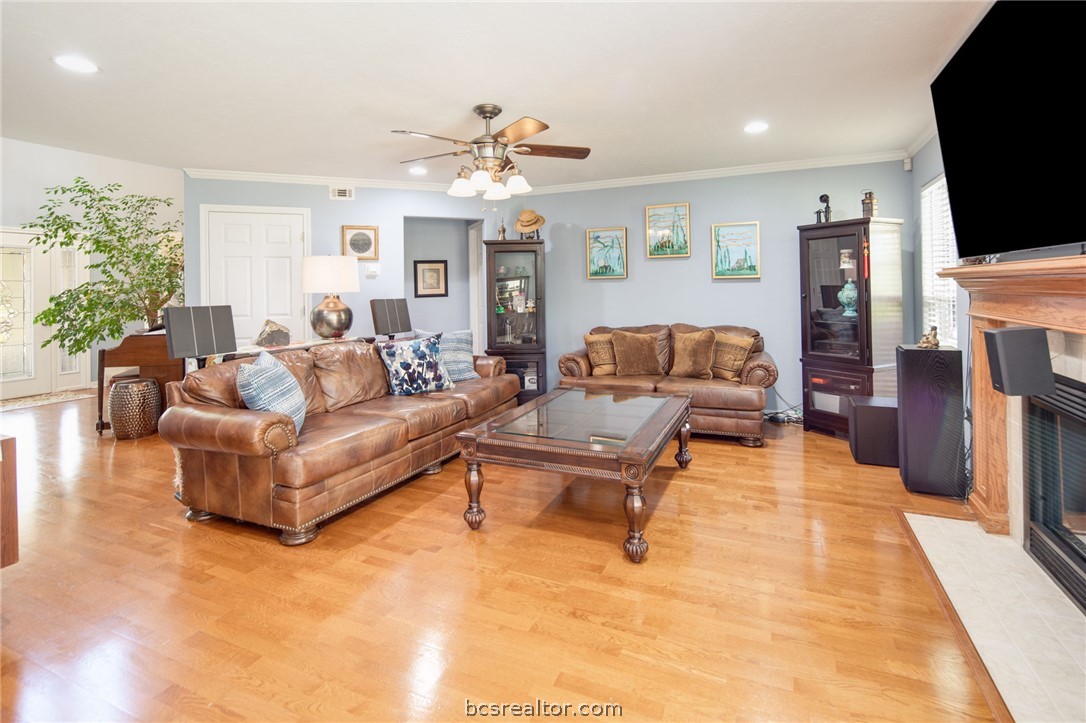 209 Ranchette Court Bryan, TX 77808 - Photo 10 of 37 a living room with furniture and a flat screen tv