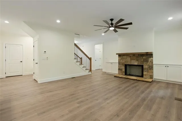 a bathroom with a sink a faucet a mirror and a window