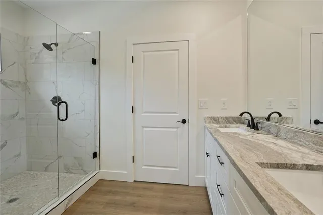 a bathroom with a picture of a shower