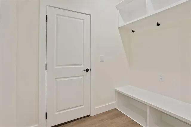 a view of a room with wooden walls