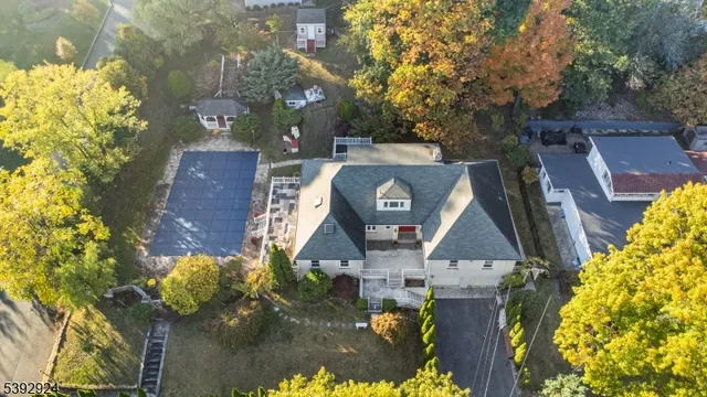 a picture of a yard with chairs