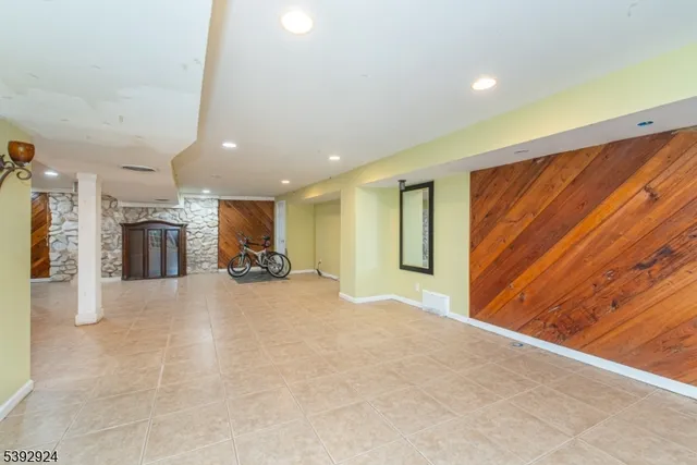 a view of a room with a refrigerator