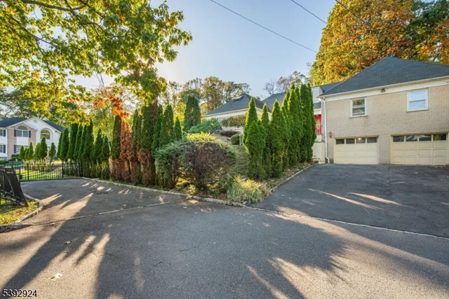 a view of a street with a building in the background