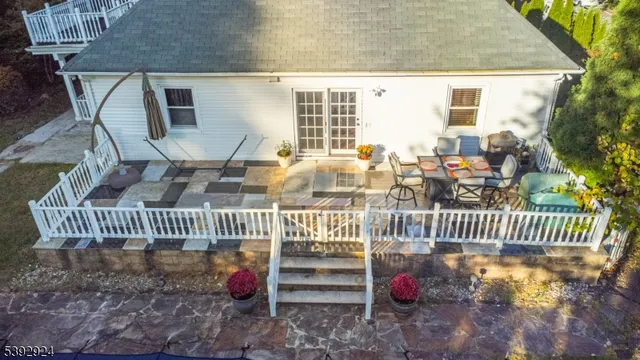 a view of a swimming pool and lounge chair