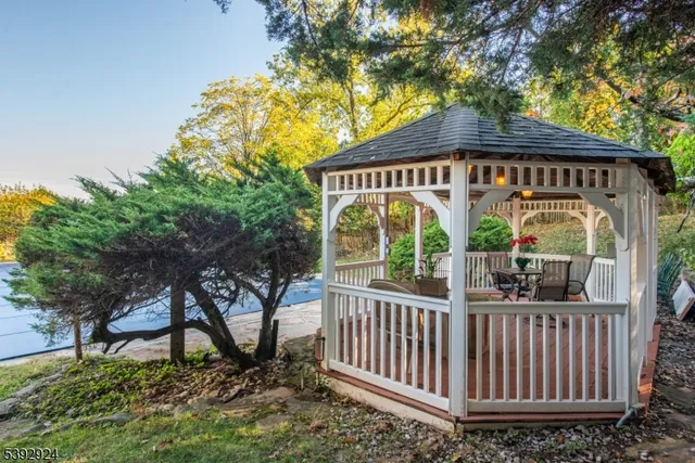 a house view with a backyard space