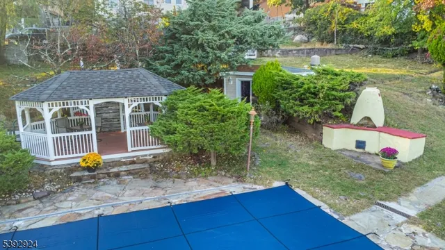 a bathroom with a sink mirror and toilet