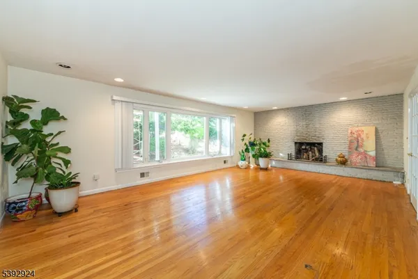 a room with window and a wooden floor
