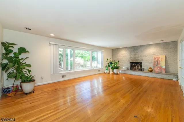 a room with window and a wooden floor