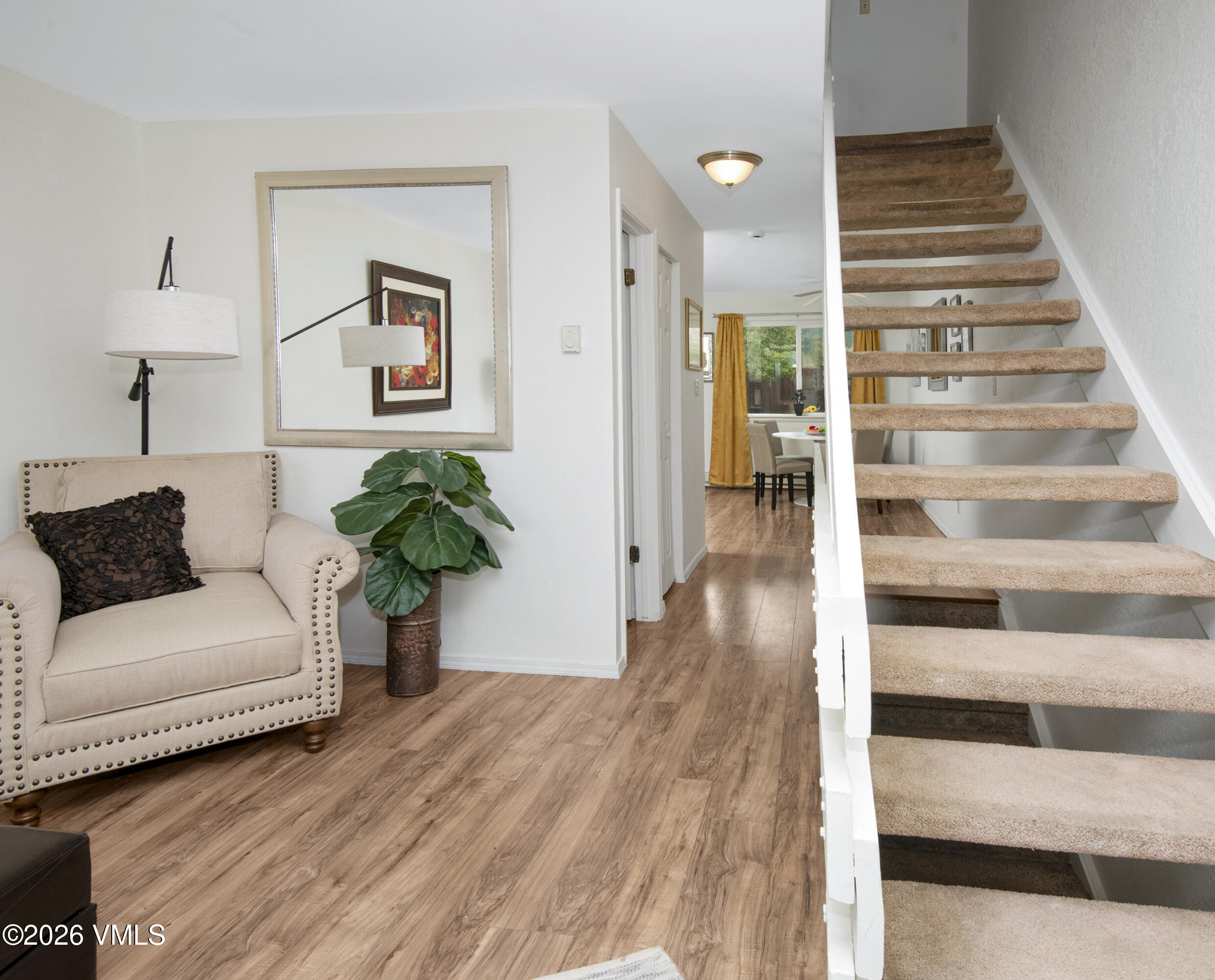 85 Chambers Avenue, Unit 10 Eagle, CO 81631 - Photo 11 of 41 a living room with furniture and a potted plant