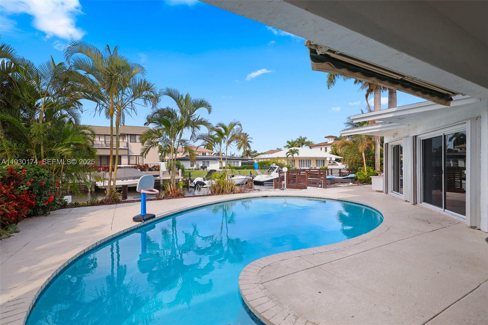 4841 Northeast 29th Avenue Lighthouse Point, FL 33064 - Photo 33 of 50 a view of swimming pool with outdoor seating