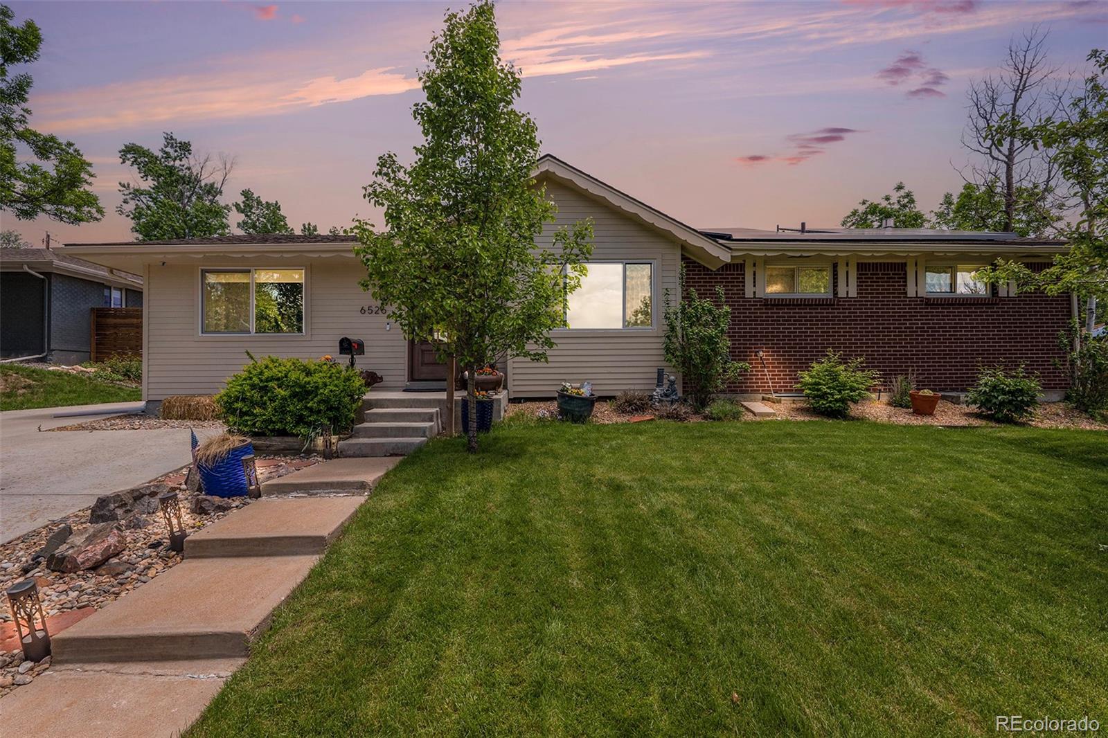6526 South Elizabeth Way Centennial, CO 80121 - Photo 1 of 38 a view of house with yard