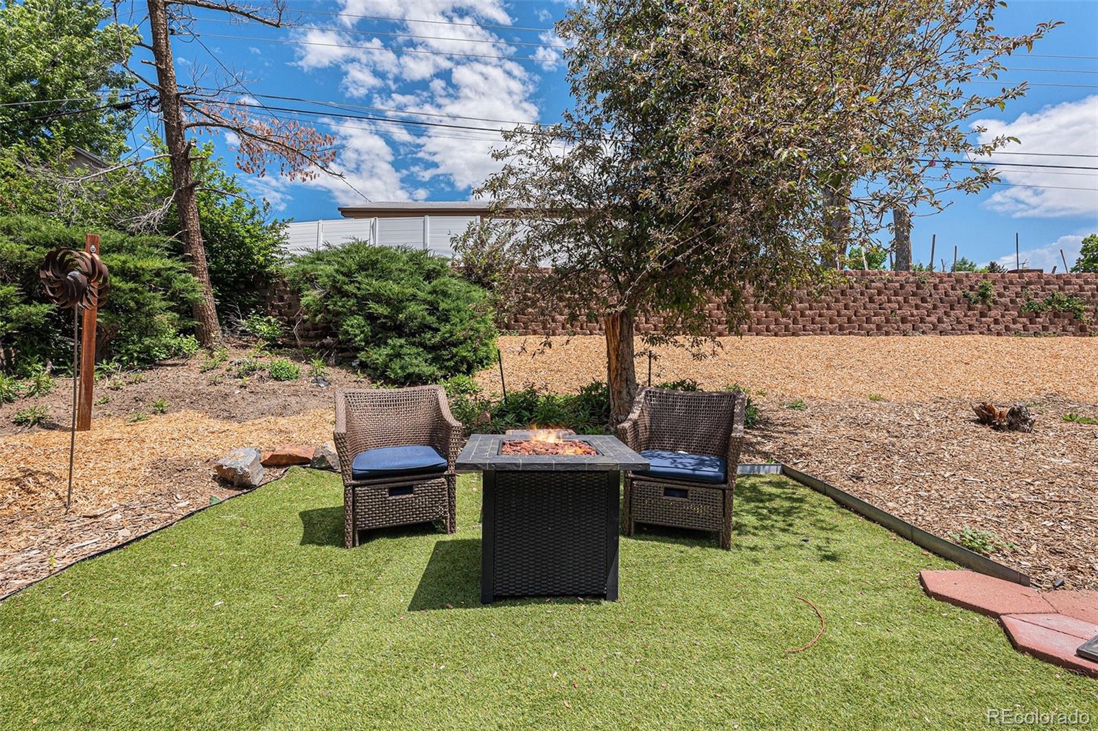 6526 South Elizabeth Way Centennial, CO 80121 - Photo 25 of 38 a view of a backyard with sitting area