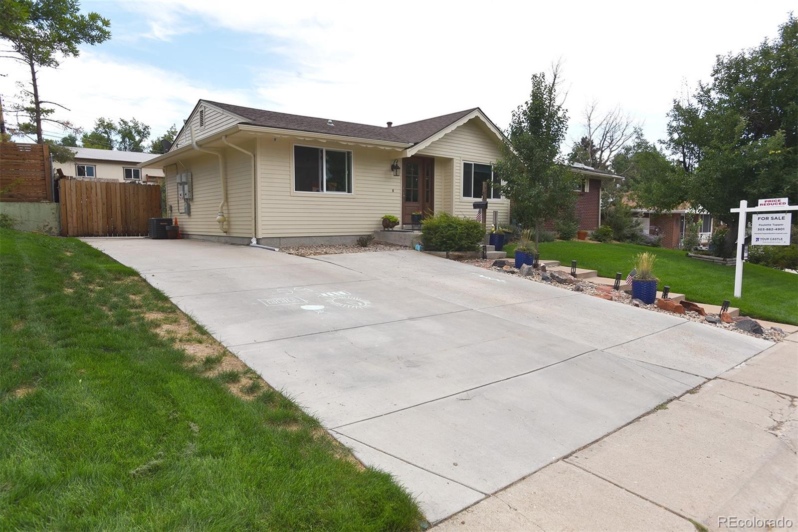 6526 South Elizabeth Way Centennial, CO 80121 - Photo 33 of 38 a view of backyard of house with garage