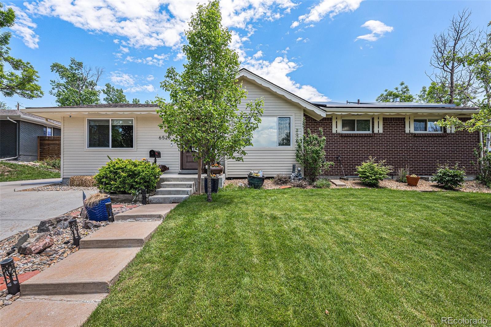6526 South Elizabeth Way Centennial, CO 80121 - Photo 38 of 38 a view of a house with a backyard