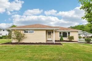 200 Edgewood Street Aliquippa, PA 15001 - Photo 1 of 47 a front view of house with yard and green space