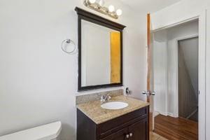 200 Edgewood Street Aliquippa, PA 15001 - Photo 19 of 47 a bathroom with a granite countertop sink and a mirror