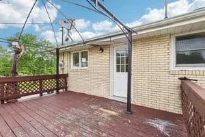 a view of a swimming pool with a yard