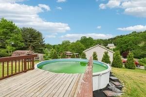 200 Edgewood Street Aliquippa, PA 15001 - Photo 42 of 47 a view of a swimming pool with a yard