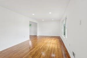 200 Edgewood Street Aliquippa, PA 15001 - Photo 6 of 47 a view of an empty room with wooden floor and a window