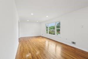 200 Edgewood Street Aliquippa, PA 15001 - Photo 7 of 47 an empty room with wooden floor and windows