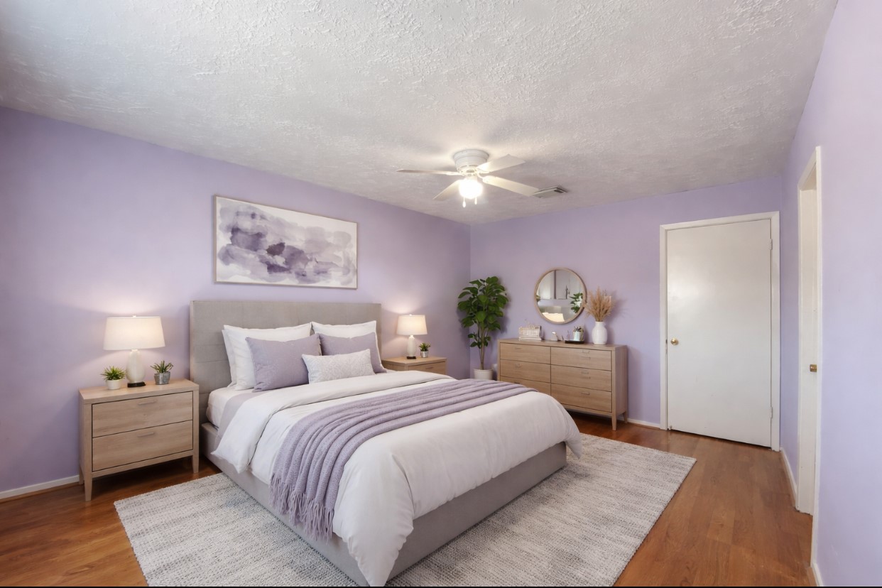 12177 Sharpview Drive Houston, TX 77072 - Photo 19 of 30 a bedroom with a bed and a chandelier