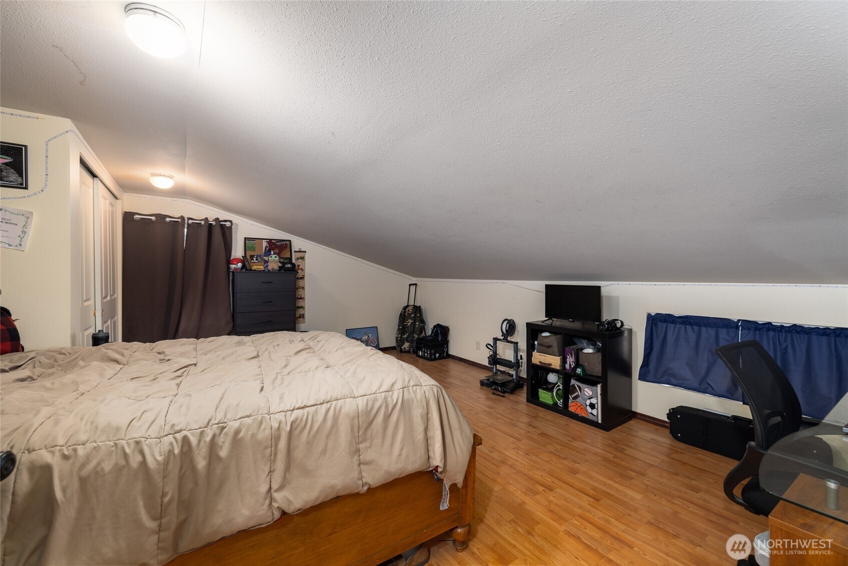 9543 Columbia Way Sedro-Woolley, WA 98284 - Photo 34 of 38 a bed room with a bed and a chair
