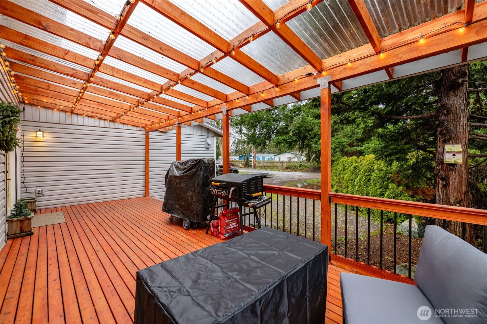 9543 Columbia Way Sedro-Woolley, WA 98284 - Photo 5 of 38 a view of a patio with wooden floor