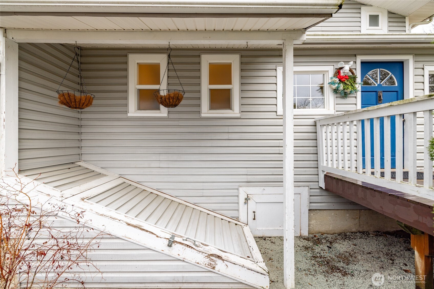 9543 Columbia Way Sedro-Woolley, WA 98284 - Photo 7 of 38 a view of a house with a balcony and stairs