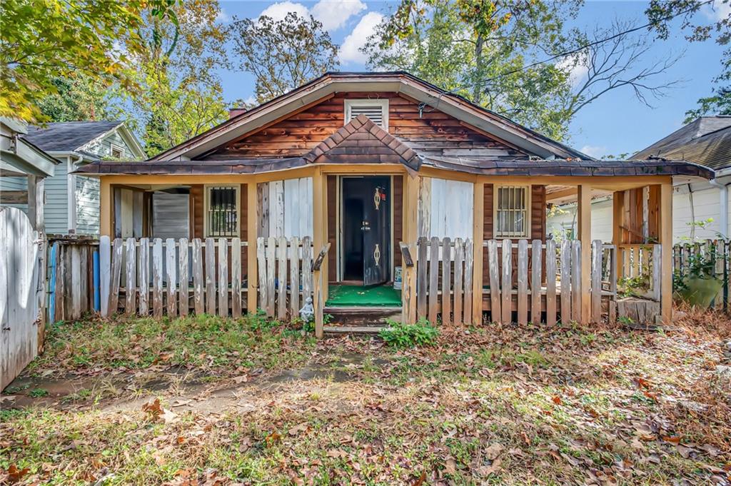 1434 Desoto Avenue Southwest Atlanta, GA 30310 - Photo 1 of 1 a front view of a house with a porch
