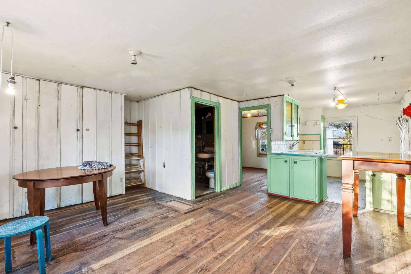 1430 Merrill Street Santa Cruz, CA 95062 - Photo 11 of 40 a view of a kitchen with furniture and wooden floor