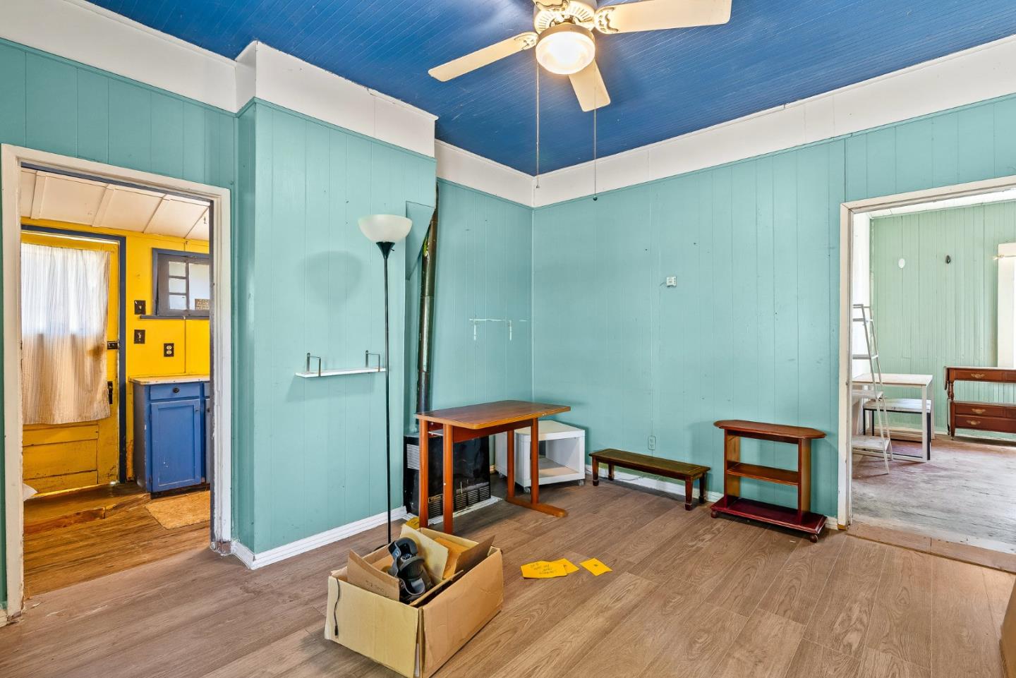 1430 Merrill Street Santa Cruz, CA 95062 - Photo 20 of 40 a room with furniture and a chandelier