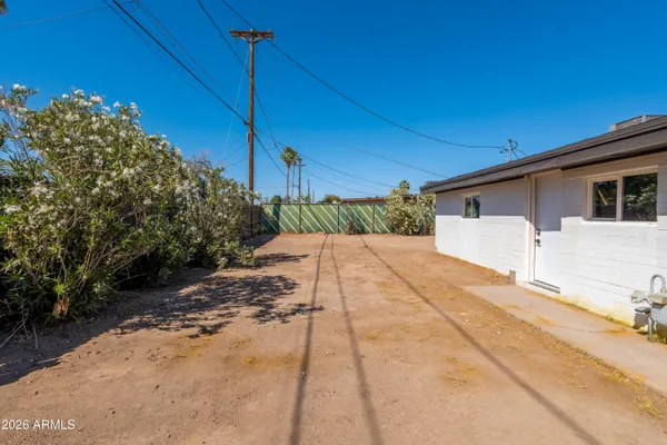 a house view with a backyard space
