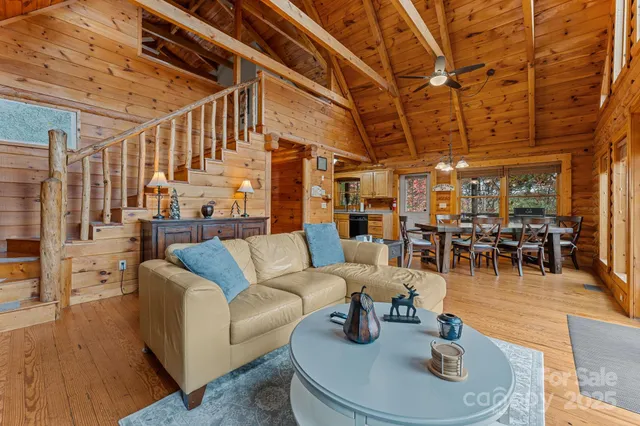 a living room with furniture and a table