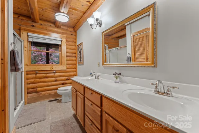 a bathroom with a sink a vanity and a bathtub