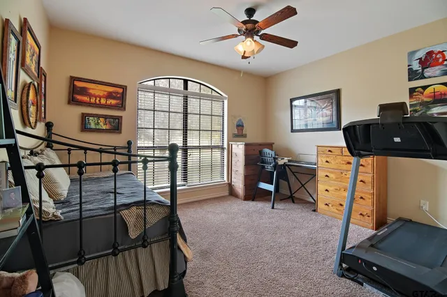 a bathroom with a sink a mirror and a shower