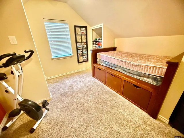 a living room with furniture window and flat screen tv