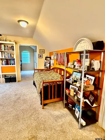 a kitchen with stainless steel appliances granite countertop a stove and a refrigerator