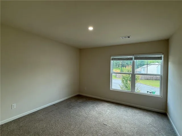 an empty room with a door