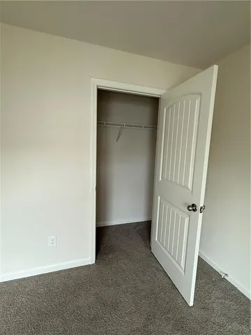 an empty room with closet