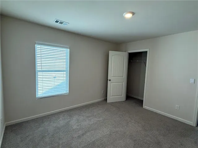 an empty room with closet