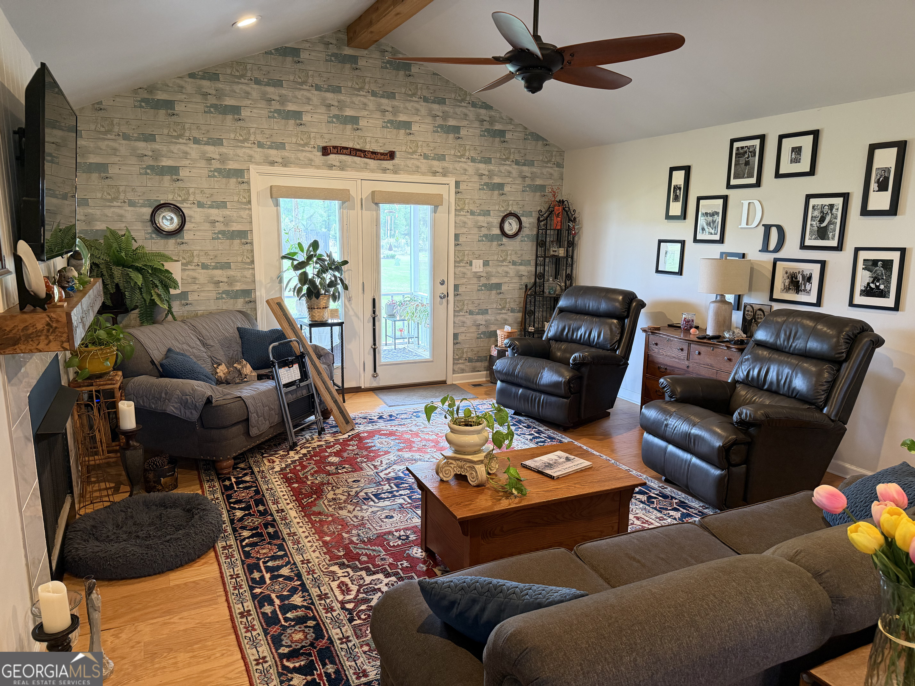 848 Tanglewood Circle Dublin, GA 31021 - Photo 11 of 21 a living room with furniture and a flat screen tv