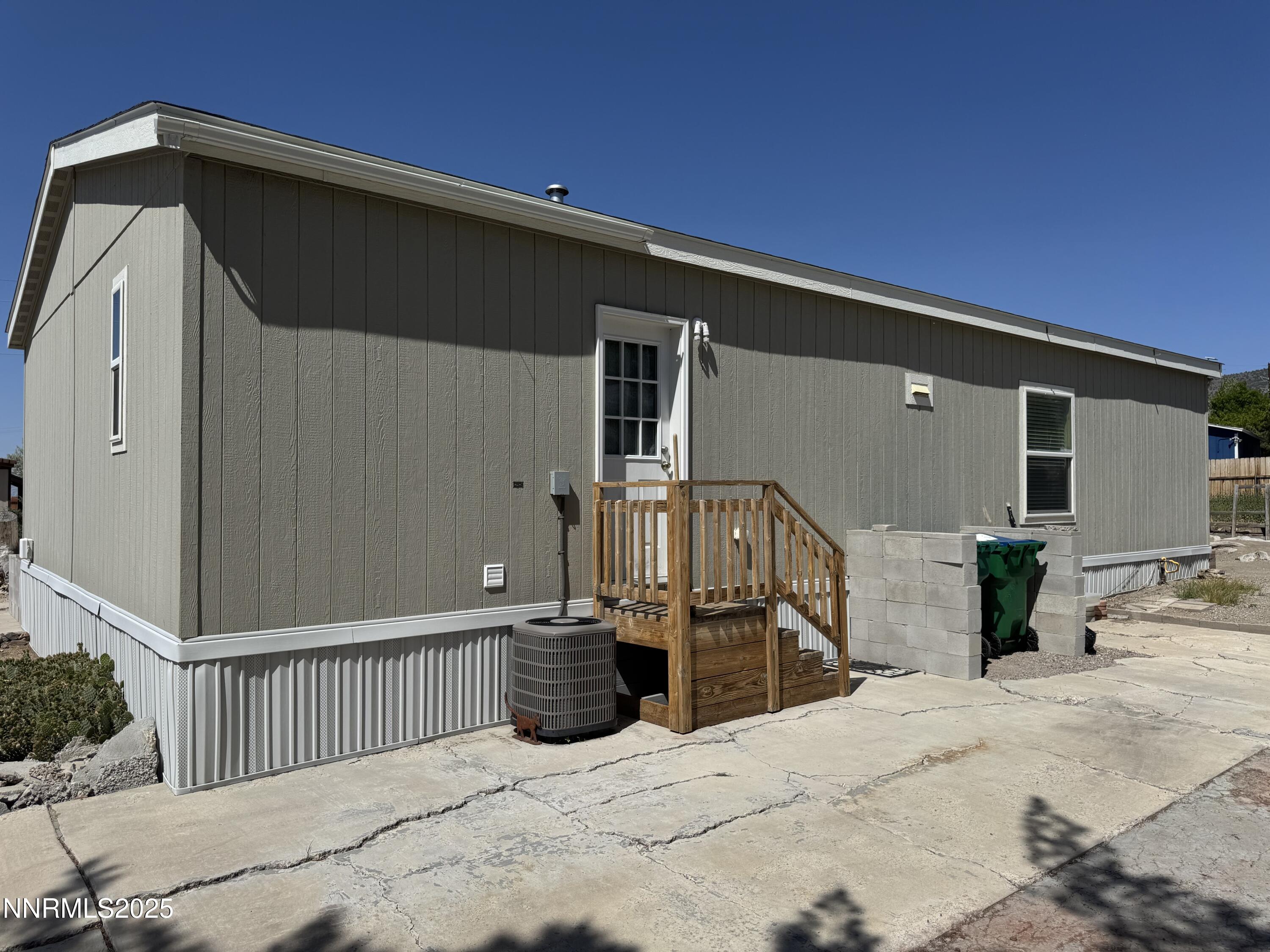 445 Mira Street Reno, NV 89521 - Photo 21 of 27 a view of a house with wooden fence