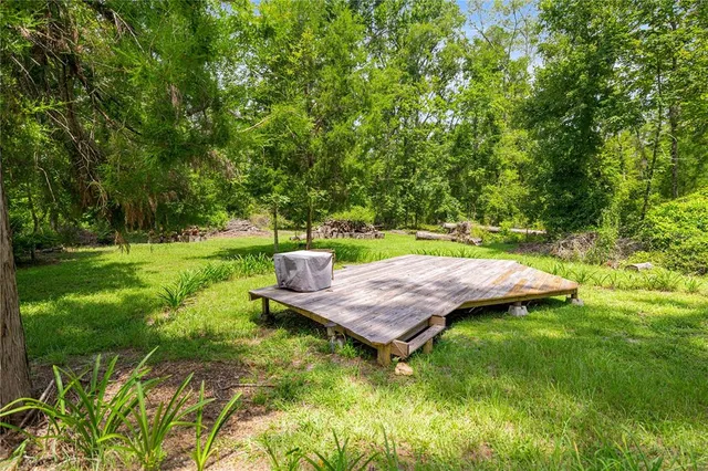 a garden view with a seating space