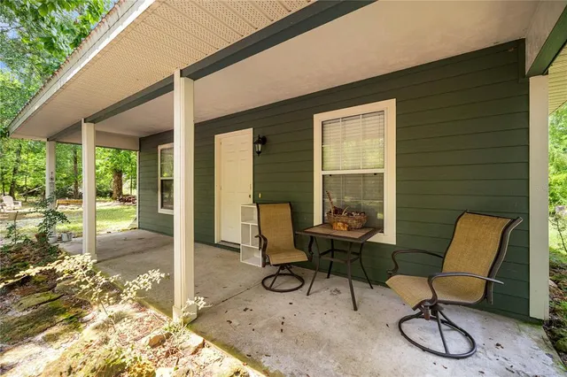 a building outdoor space with patio furniture