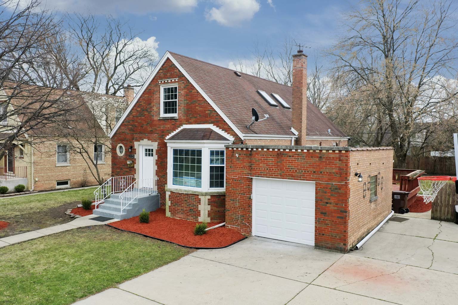 1923 186th Place Homewood, IL 60430 - Photo 2 of 39 a front view of a house with a yard