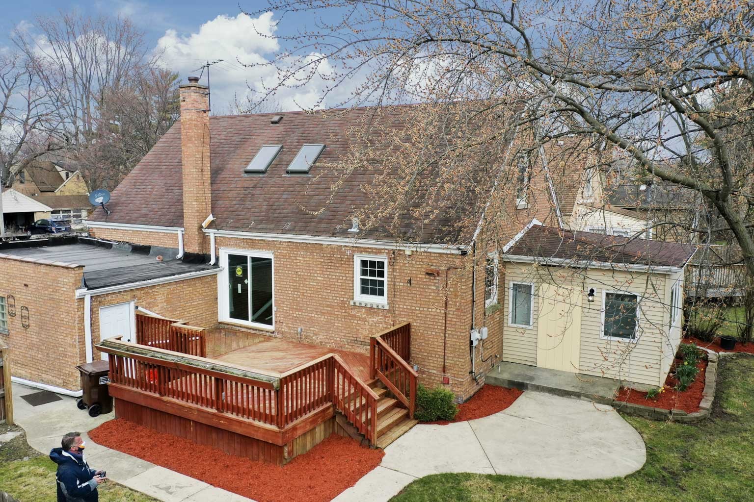 1923 186th Place Homewood, IL 60430 - Photo 11 of 39 a view of a patio with table and chairs with wooden fence and plants