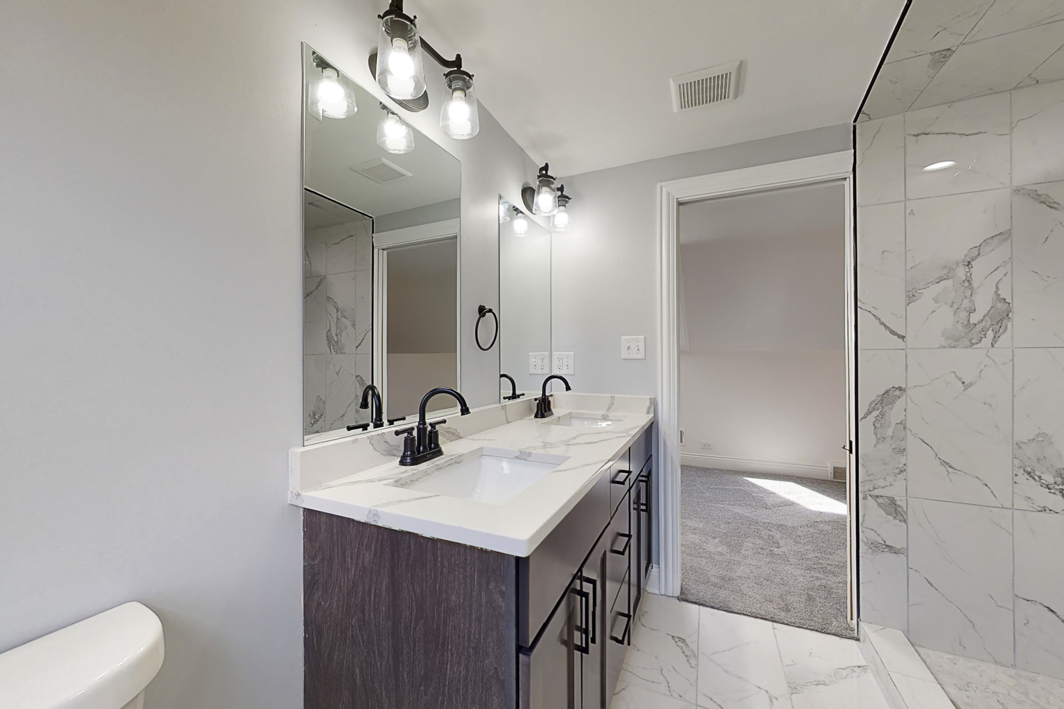 1923 186th Place Homewood, IL 60430 - Photo 33 of 39 a bathroom with a sink a toilet and a mirror