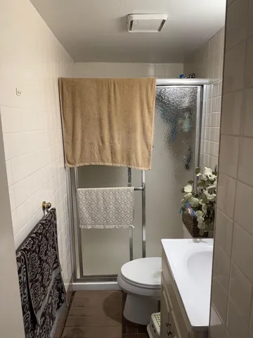 a bathroom with a sink and toilet