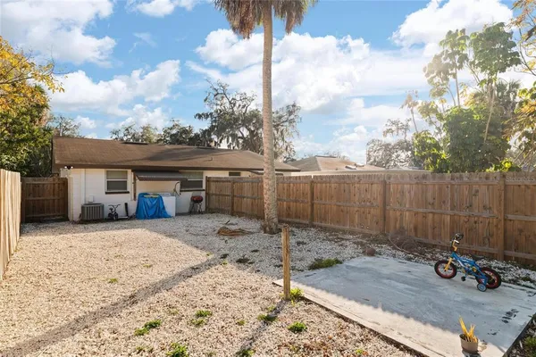 a view of back yard of the house